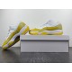 AIR JORDAN 11 LOW WMNS “YELLOW SNAKESKIN” AH7860-107